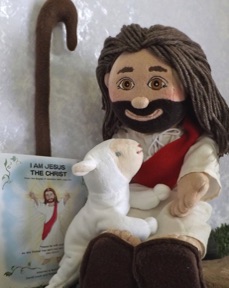 Jesus doll with lamb